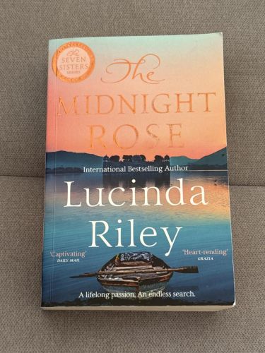 Portada del libro de The Midnight Rose: A spellbinding tale of everlasting love from the bestselling author of The Seven...